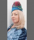 Ольга 48 ans Санкт-Петербург Russie