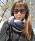 Elena 55 ans Paris France
