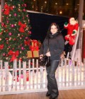 Elena 49 ans Paris France
