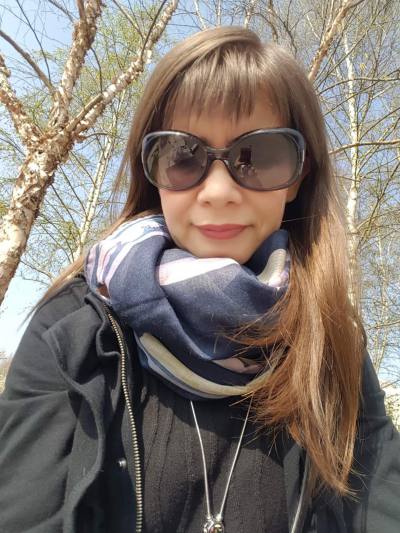 Elena 55 ans Paris France